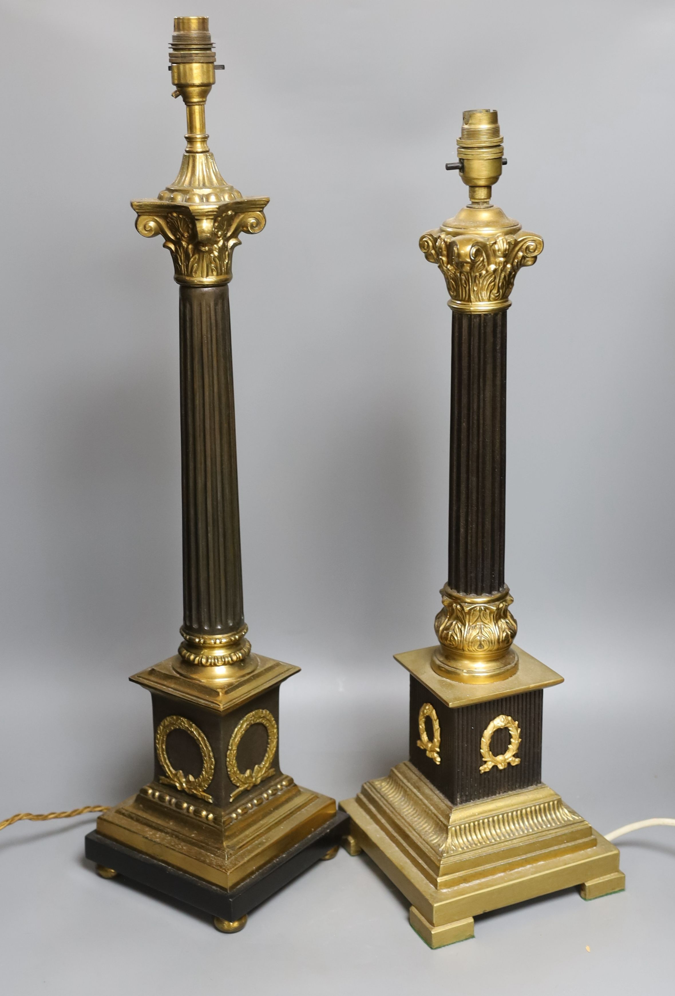 Two composite column table lamps - tallest 66cm